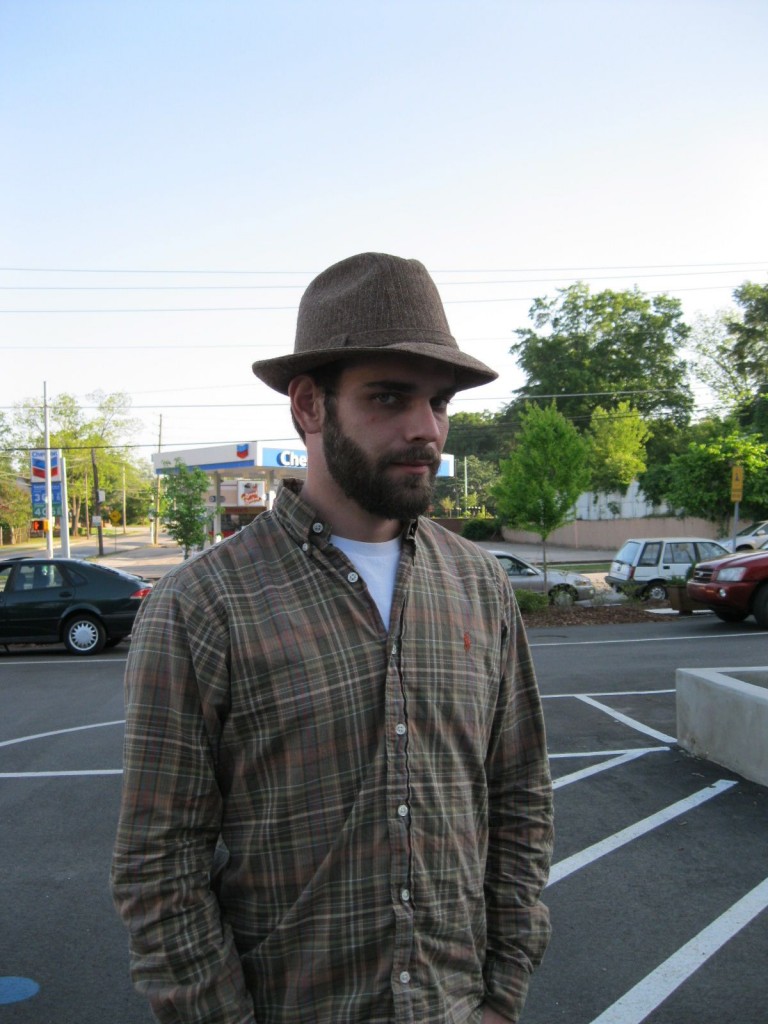 The youngest son, Chris, sporting the vintage hat he stole :) right out of inventory!